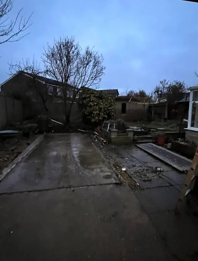 Bare concrete base left after the garage was dismantled and taken away